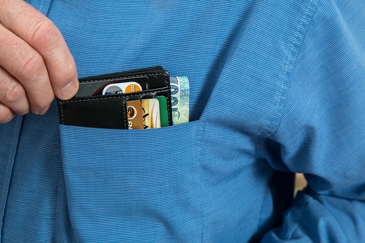 credit cards and cash in pocket
