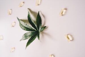 marijuana leaf and pills
